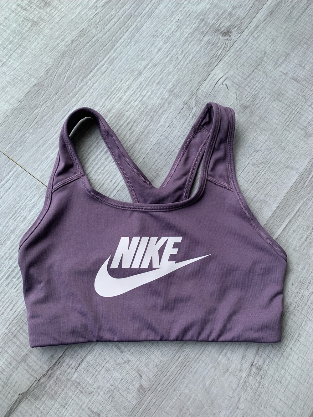 Nike Women's Plum Purple Racerback Sports Bra with White Swoosh, Size S.